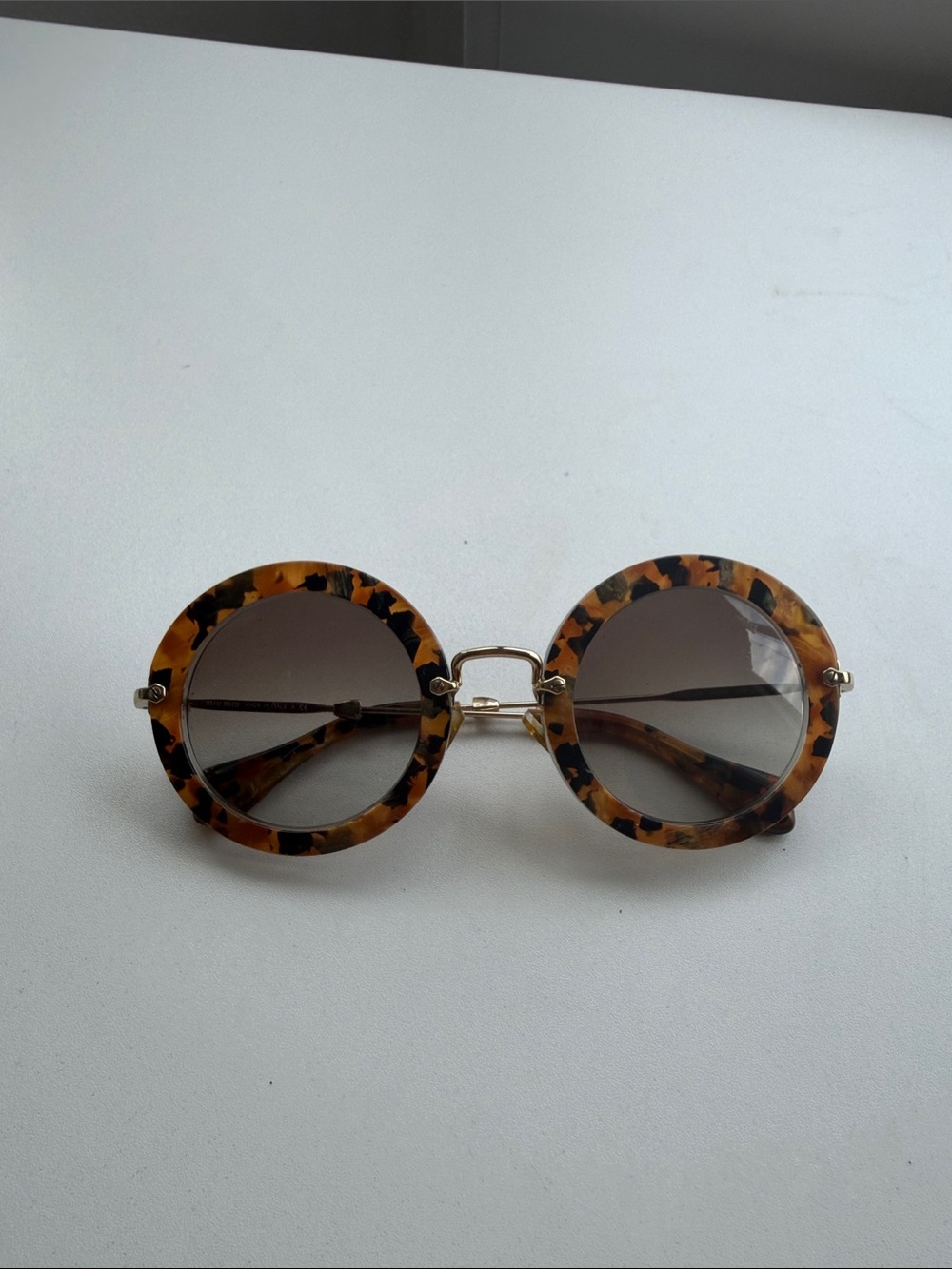 Miu Miu Circle glasses